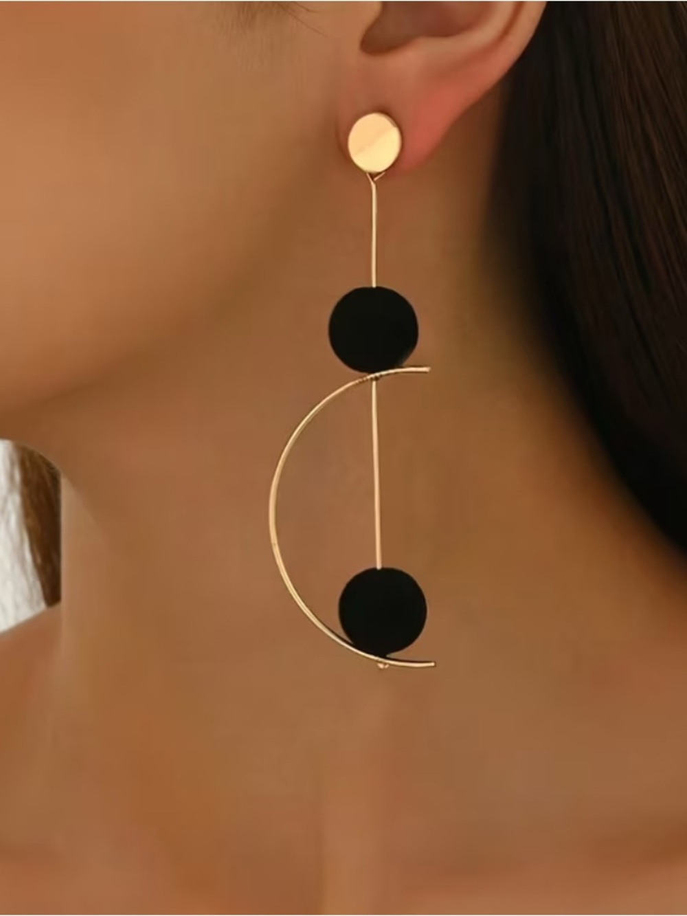 Gold-tone Drop Earrings with Black Discs